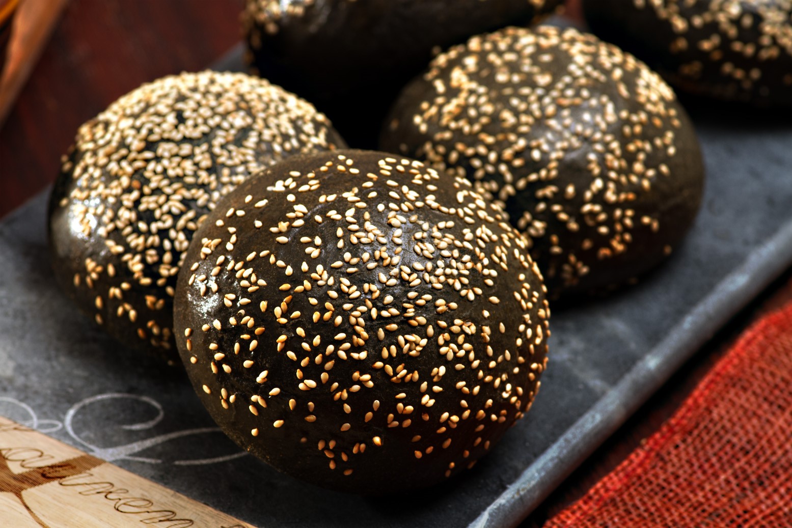 Laurent Charcoal Brioche Burger Roll Sesame Seed 65 x 90g Ora Foods